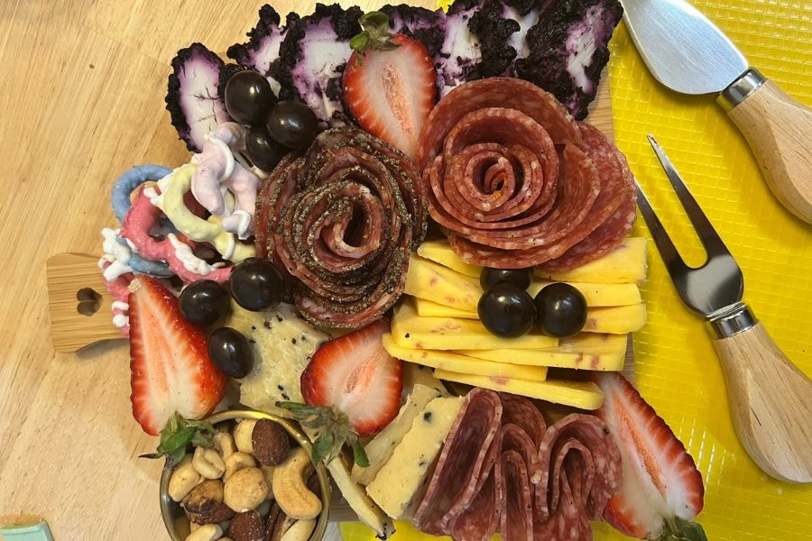 A beautifully finished student charcuterie board from a Classy Snacks workshop